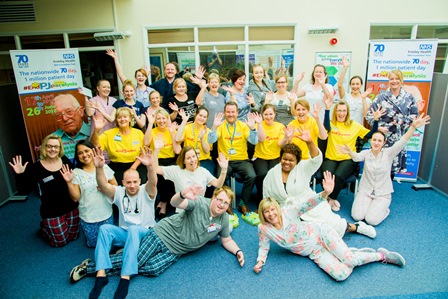 A group of staff wearing their pyjamas to work