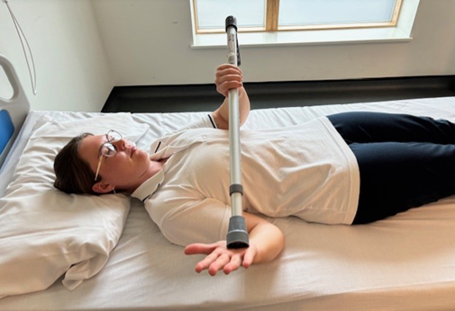 shoulder rotation stretch - arm by side.png
