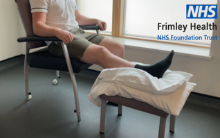 seated knee stretch.png